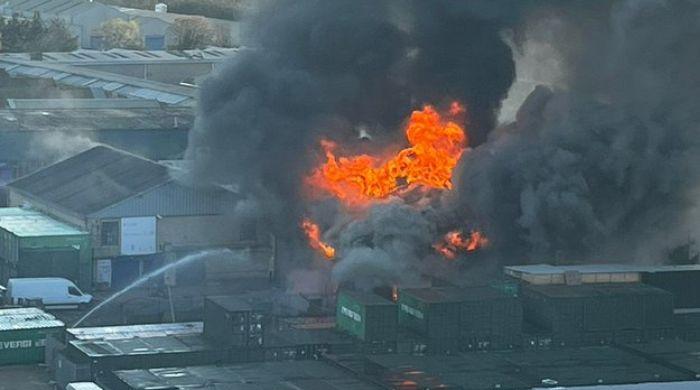 Major warehouse fire in West London sends huge plume of smoke over city