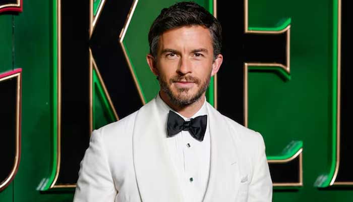 Jonathan Bailey stars opposite Ariana Grande and Cynthia Erivo in Wicked