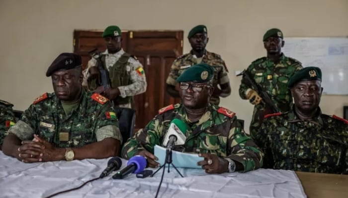 Brigadier General Denis NCanha, head of the military office of the Guinea-Bissau presidency, announces the government takeover on November 26, 2025. — AFP