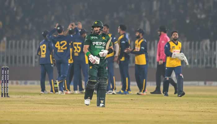 Pakistan’s Sahibzada Farhan walks back after his dismissal during their T20I tri-series game against Sri Lanka at the Rawalpindi Cricket Stadium, November 27, 2025. — PCB