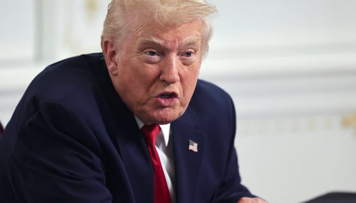 US President Donald Trump speaks with members of the media following a call with military service members, on Thanksgiving, in Palm Beach, Florida, US, November 27, 2025. — Reuters