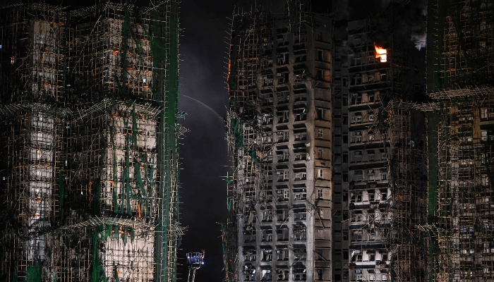 A general view shows the aftermath of a major fire that swept through several apartment blocks at the Wang Fuk Court residential estate in Hong Kongs Tai Po district on November 27, 2025. — AFP