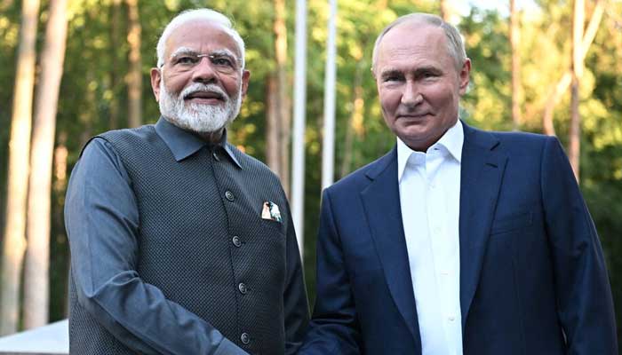 Russias President Vladimir Putin welcomes Indias Prime Minister Narendra Modi during their meeting at a residence near Moscow, Russia July 8, 2024. — Reuters