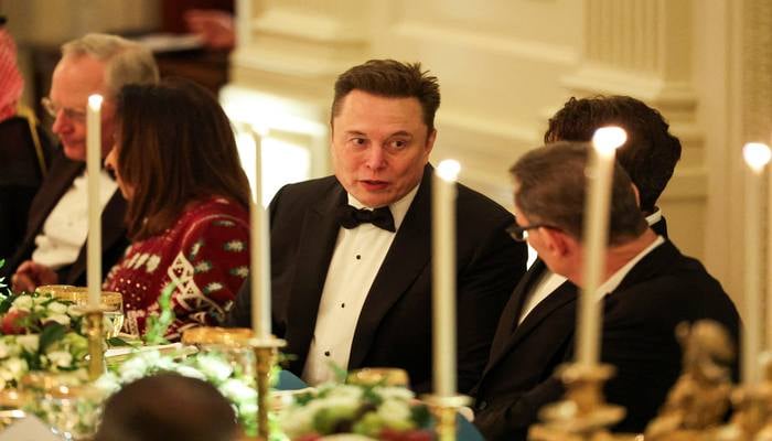 Elon Musk and Mohamed bin Salman meeting Saudi officials