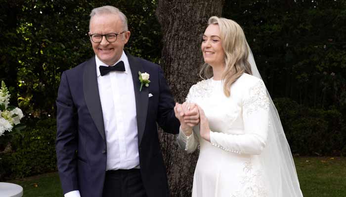 Australian Prime Minister Anthony Albanese (Left) and his new wife Jodie Haydon stand together during their wedding ceremony in Canberra on November 29, 2025. — AFP