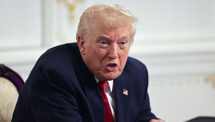 US President Donald Trump speaks with members of the media following a call with military service members, on Thanksgiving, in Palm Beach, Florida, US, November 27, 2025. — Reuters