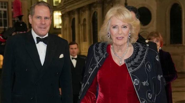 Queen Camilla breaks out Charles' 27 year robe; designer nearly fell off chair