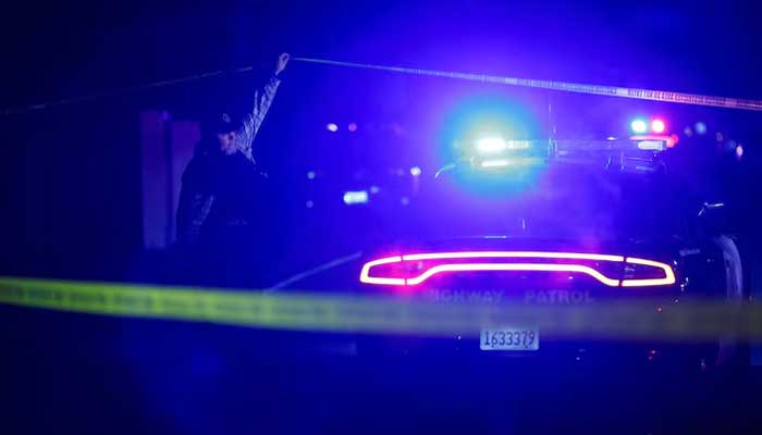 A police officer works at the scene after several people were shot at a family gathering in Stockton, California, US on  November 29, 2025. — Reuters