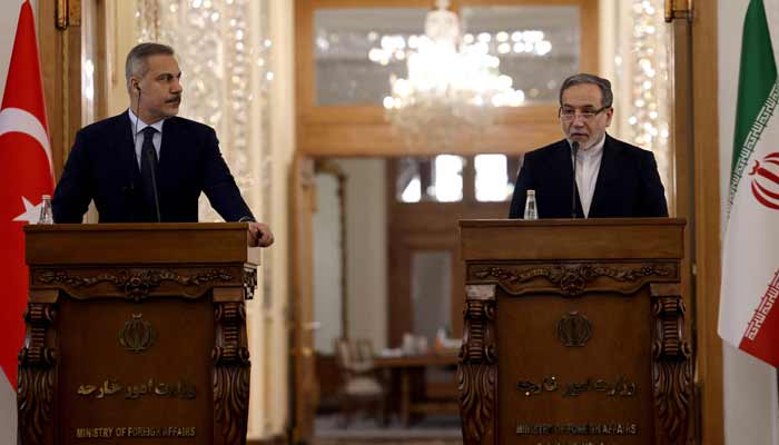Turkiyes Foreign Minister Hakan Fidan (Left) and Irans Foreign Minister Abbas Araghchi holds a joint press conference in Tehran on November 30, 2025.— AFP