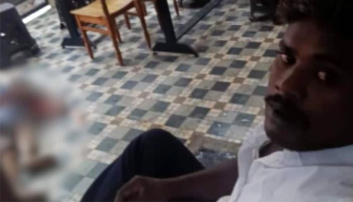 Man, who killed his wife in Tirunelveli city of Indias Tamil Nadu, takes selfie with her dead body. — Screengrab via YouTube/Indian media