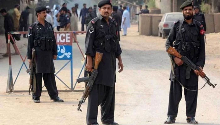 Security officials stand alert in an area of Khyber Pakhtunkhwa. — APP/File