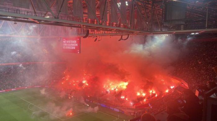 Ajax game halted by supporter fireworks, rescheduled for empty stadium on Tuesday