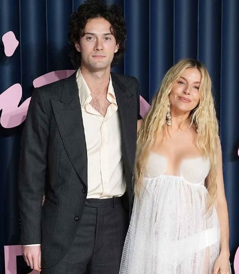‘American Sniper star Sienna Miller debuts baby bump for third pregnancy