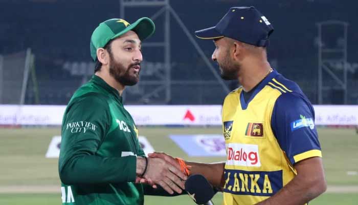 Pakistan captain Salman Ali Agha (left) and Sri Lanka captain Dasun Shanaka shake hands at the toss ahead of their T20I tri-series match at Rawalpindi Cricket Stadium on November 22, 2025. – PCB