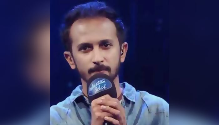 Pakistan Idol contestant, Rohail Asghar, performs on stage during competition. — Geo News