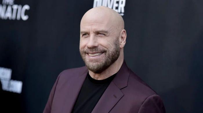 John Travolta gives 'Greased Lightnin'' a Santa-inspired revival