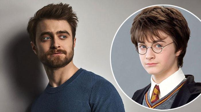 'Harry Potter' Daniel Radcliffe lights up room as he embraces big rival
