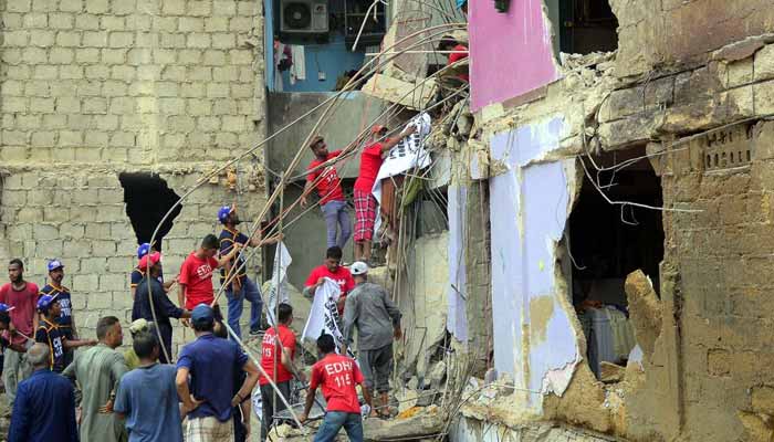 Rescue efforts underway after a residential building collapsed in Lyari, Karachi, July 6, 2025. — PPI