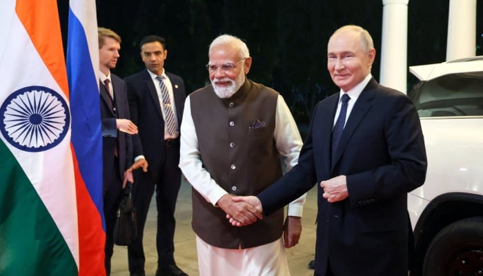 Russian President Vladimir Putin and Indian Prime Minister Narendra Modi arrive for an informal dinner at the Prime Ministers Residence in New Delhi, India December 4, 2025. — Reuters