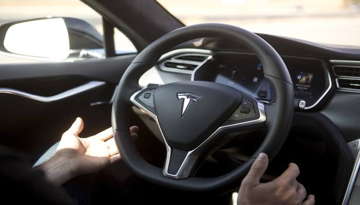 Latest Tesla FSD update allows texting while driving, which is illegal in most US states