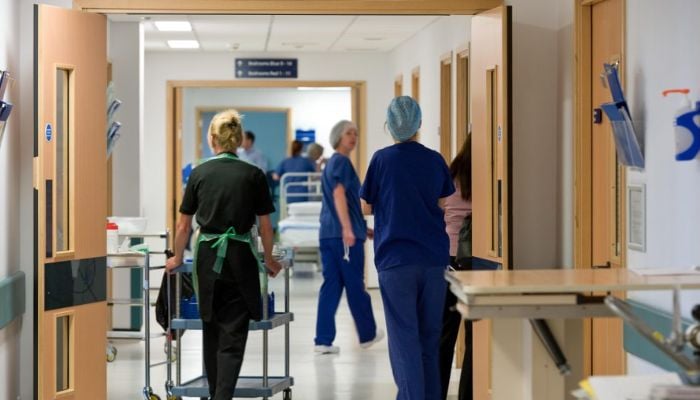 NHS confronts ‘unprecedented flu wave’ as hospital admissions soar 56% in UK