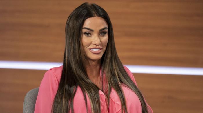 Katie Price pushes through tattoo pain as doctors halt surgery plans