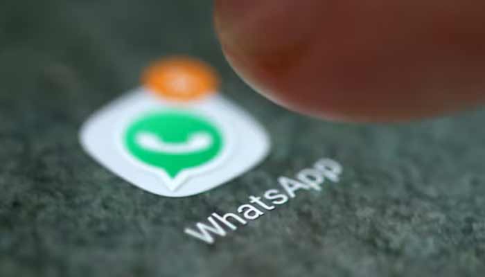 The WhatsApp app logo is seen on a smartphone in this picture illustration. — Reuters