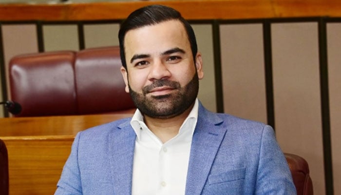Minister of State for Law and Justice Barrister Aqeel Malik gestures during an event. — Instagram/barristeraqeelmalik/File