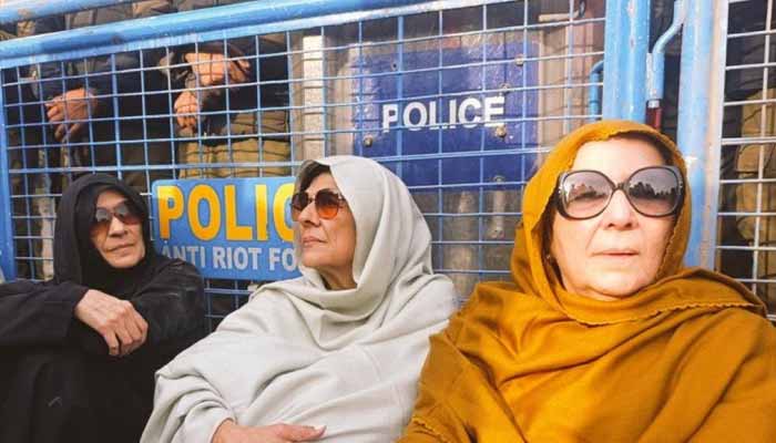 PTI Imran Khans sisters hold a sit-in front of a police barricade near Adiala jail, Rawalpindi on December 9, 2025. — X@PTIofficial