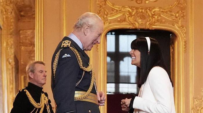King Charles and Claudia Winkleman dance into royal honour