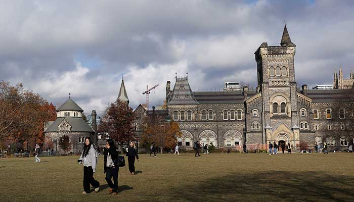 Students walk at the St. George campus of the University of Toronto, in Toronto, Canada, November 20, 2025. — Reuters