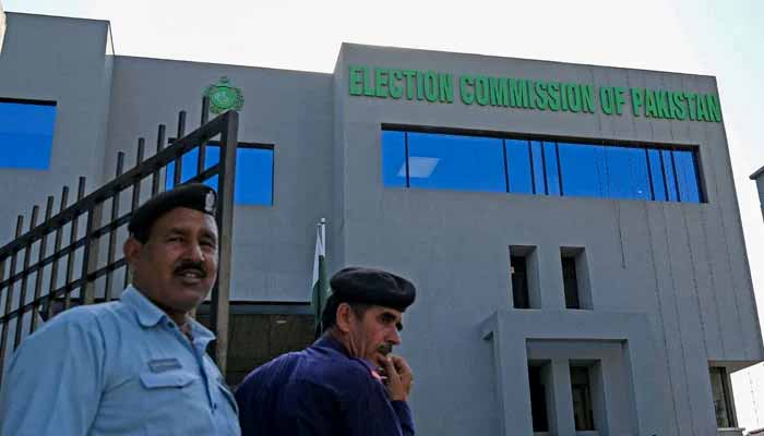 Security personnel stand guard at the headquarters of the Election Commission of Pakistan in Islamabad on September 21, 2023. — AFP