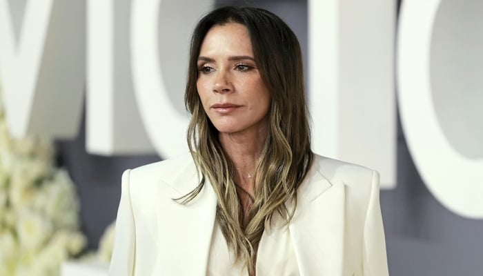 Victoria Beckham’s silk midi turns heads as family strain eases
