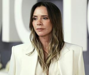 Victoria Beckham's silk midi turns heads as family strain eases