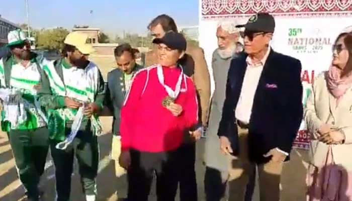 Pakistan Army players receive National Games gold medals after beating WAPDA in the womens softball final at the KMC Sports Complex in Karachi on December 10, 2025. — Geo Super