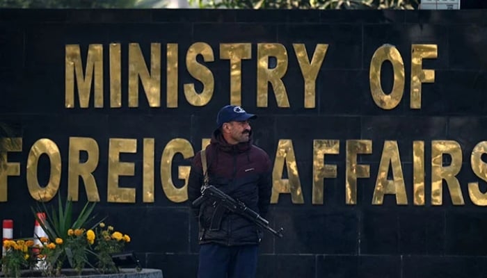 A security personnel stands guard outside the office of the Ministry of Foreign Affairs in Islamabad. — AFP/File