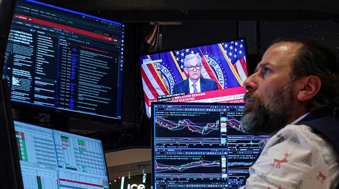 Divided US Fed makes third straight rate cut on jobs risks