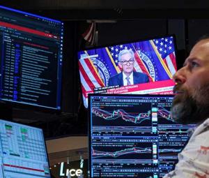 Divided US Fed makes third straight rate cut on jobs risks