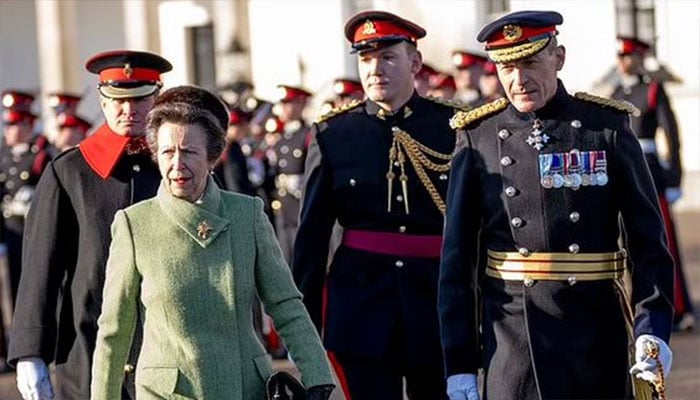 Princess Anne marches into Sandhurst as 90s love story steals the parade