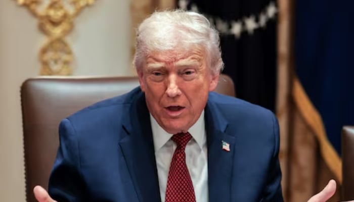 US President Donald Trump gestures as he attends a roundtable discussion on the day he announced an aid package for farmers, at the White House in Washington, DC, US, December 8, 2025. — Reuters