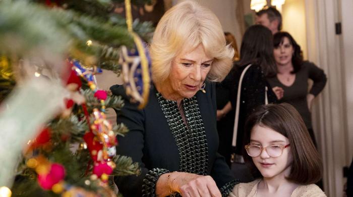 Queen Camilla creates magical moments in emotional event