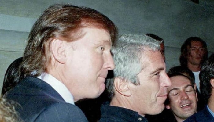 This undated photo from the personal collection of Jeffrey Epstein provided by the Democrats on the House Oversight Committee on December 12, 2025, shows US President Donald Trump, flanked by Epstein. — AFP
