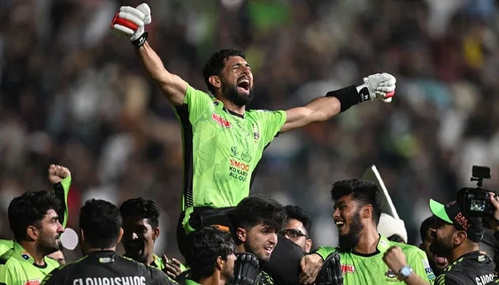 Lahore Qalandars players celebrate as Sikandar Raza plays the match-winning innings in the grand finale of the Pakistan Super League (PSL) 10 against Quetta Gladiators at Gaddafi Stadium in Lahore on May 25, 2025. – AFP