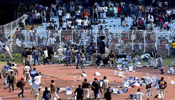 Police and security clash with fans after Argentine soccer star Lionel Messi left Vivekananda Yuva Bharati Krirangan in Kolkata, India, on December 13, 2025. — Reuters