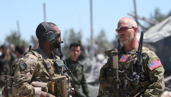 US forces are seen at the Kurdish Peoples Protection Units (YPG) headquarters in Mount Karachok in this undated image near Malikiya, Syria. — Reuters/File