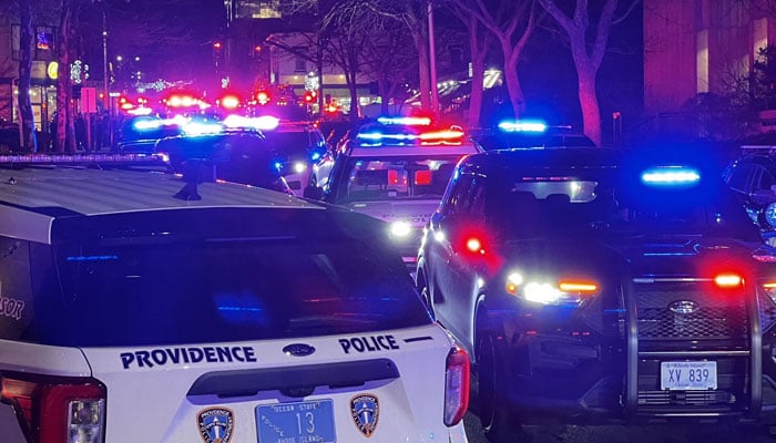 Police personnel cordon off the crime scene at Brown University on December 14, 2025. — X/@RepNancyMace