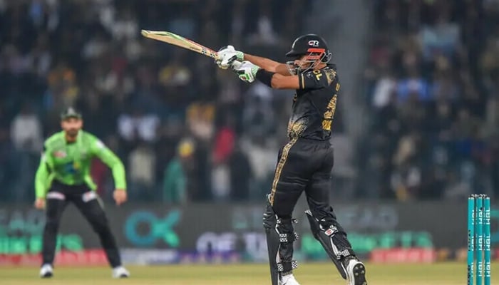 Peshawar Zalmis Babar Azam plays a shot during their Pakistan Super League (PSL) 10 match against Lahore Qalandars at the Gaddafi Cricket Stadium in Lahore on February 25. — AFP