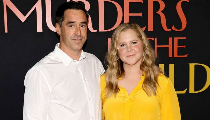 Chris Fischer and Amy Schumer have called it quits after battling rumours