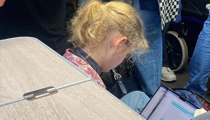 Lady Louise Windsor takes the floor on packed London Bristol train