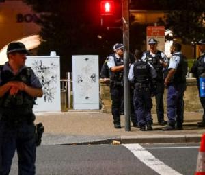 Major cities heighten security around Hanukkah events after Sydney shooting